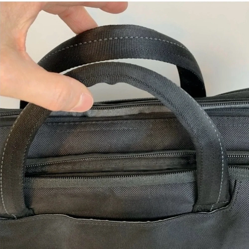 Dell Black Padded Laptop Bag with Top Handles and Structured Shape